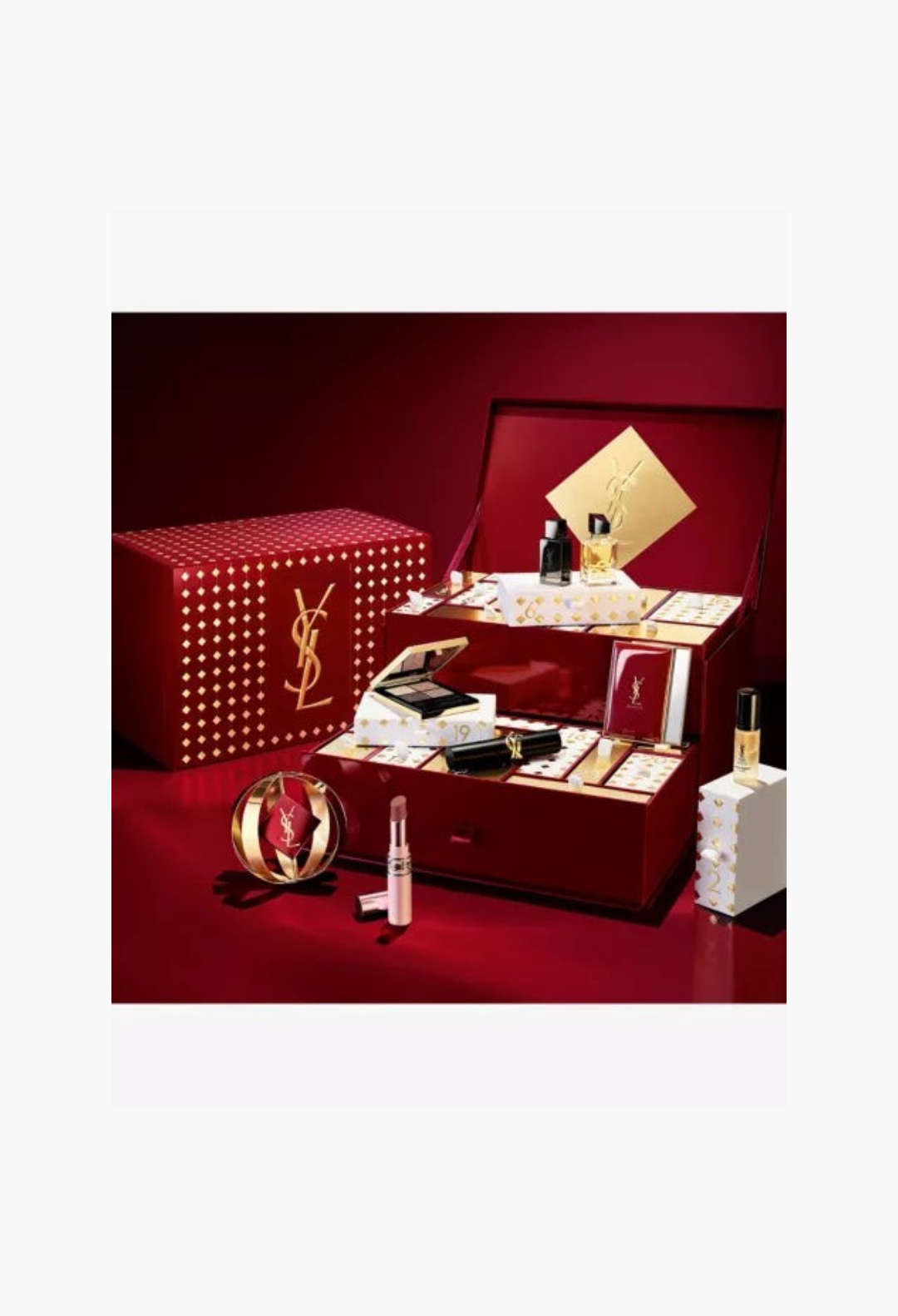GLAM MODA Yves Saint Laurent 2026 advent calendar featuring luxury makeup, skincare, and fragrance miniatures in red