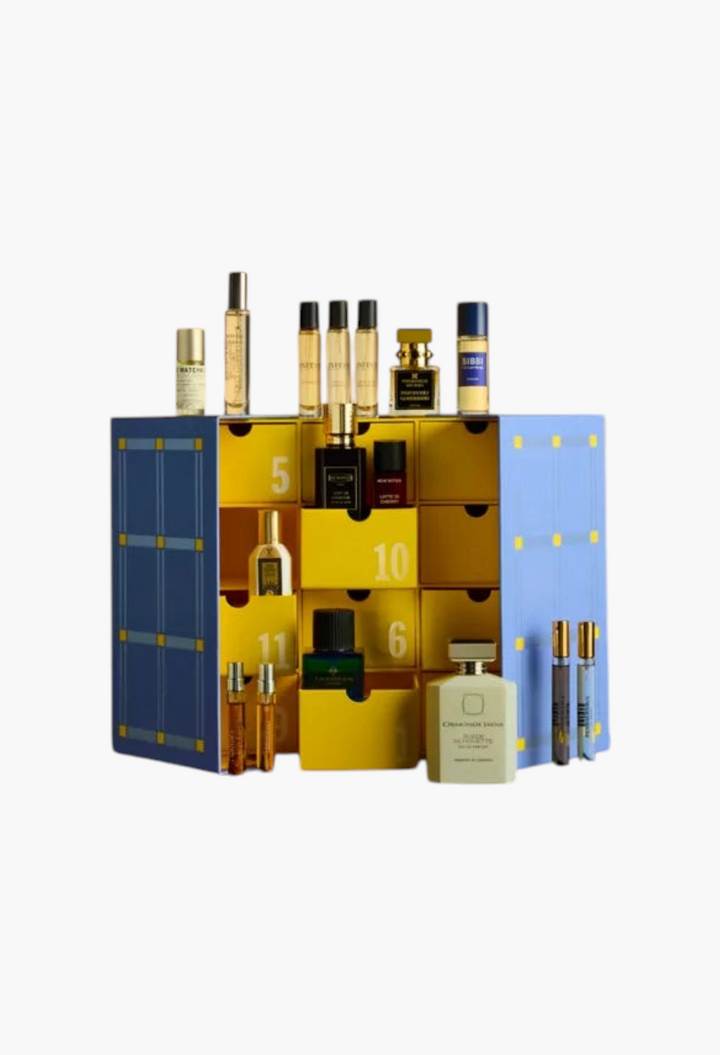 GLAM MODA Fragrance Advent Calendar 2026 featuring a blue and yellow box filled with luxury perfume bottles