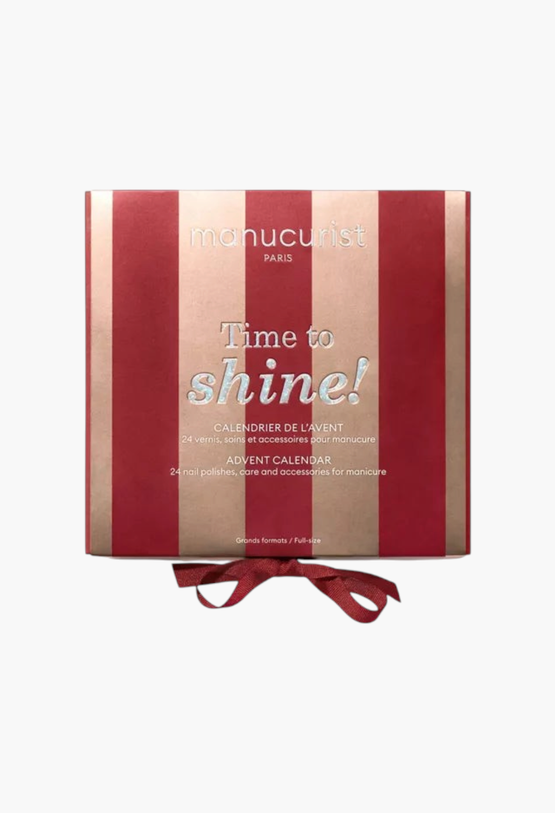GLAM MODA Manucurist Time to Shine! Advent Calendar box with red and gold stripes and a festive ribbon closure.