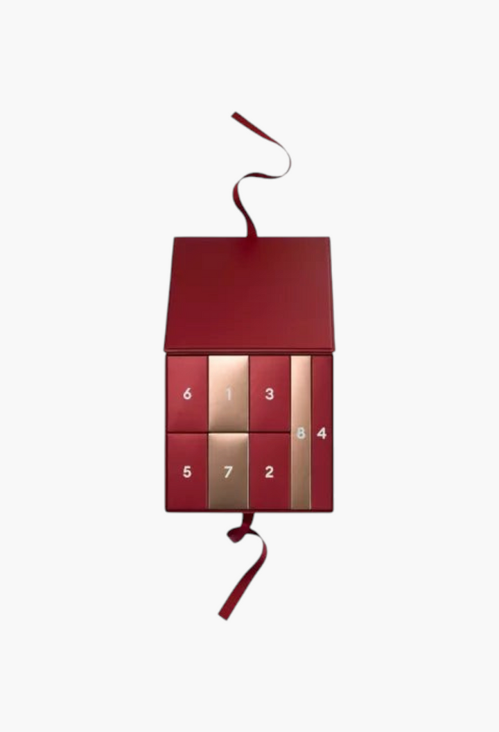 GLAM MODA Manucurist Time to Shine! Advent Calendar in a deep red box with numbered drawers for holiday nail care.