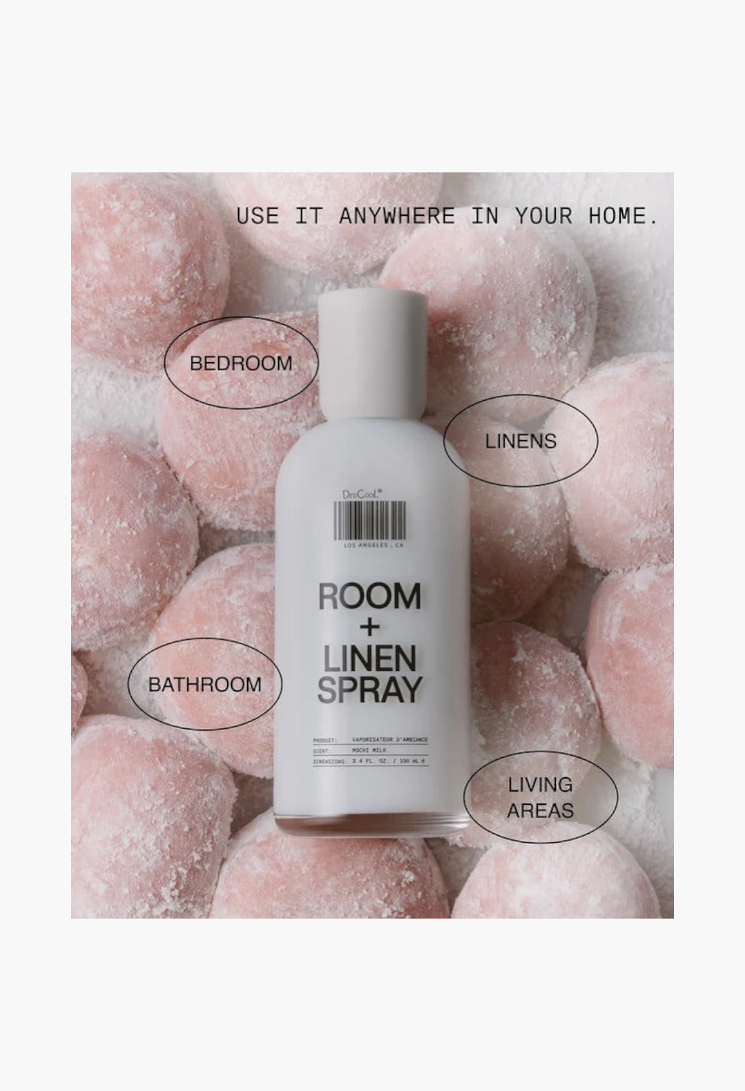 GLAM MODA Mochi Milk room and linen spray in a recyclable glass bottle surrounded by soft pink mochi treats.