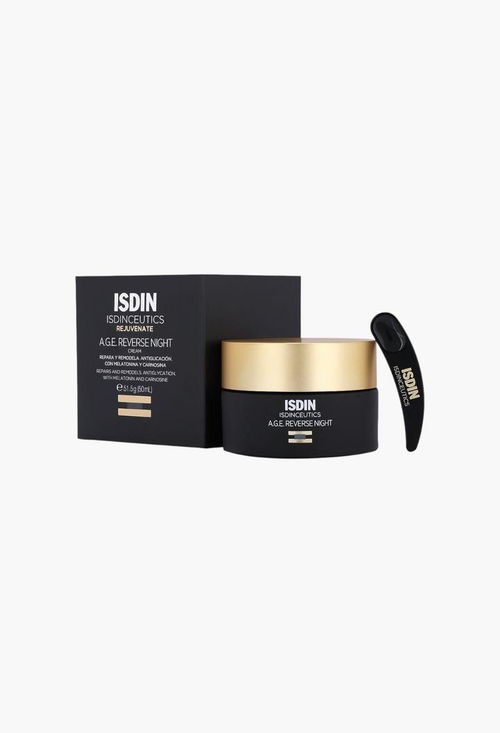 GLAM MODA Isdinceutics A.G.E. Reverse Night Cream jar with black box and applicator spatula on a white background.