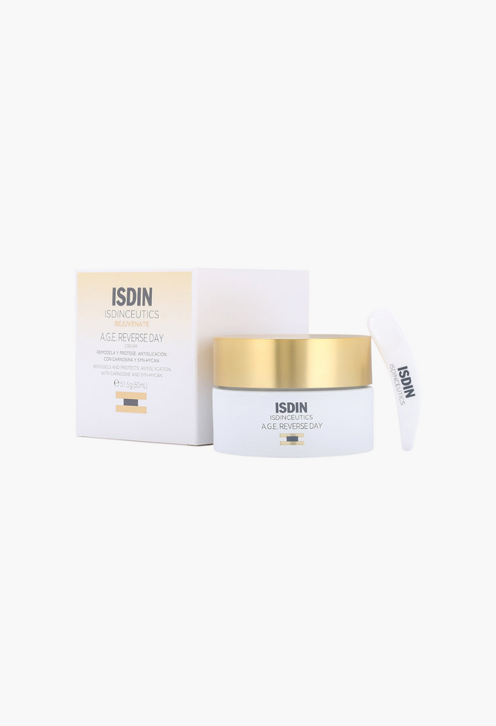 GLAM MODA Isdinceutics A.G.E. Reverse Day anti-aging cream jar with gold lid, white box, and applicator spatula.