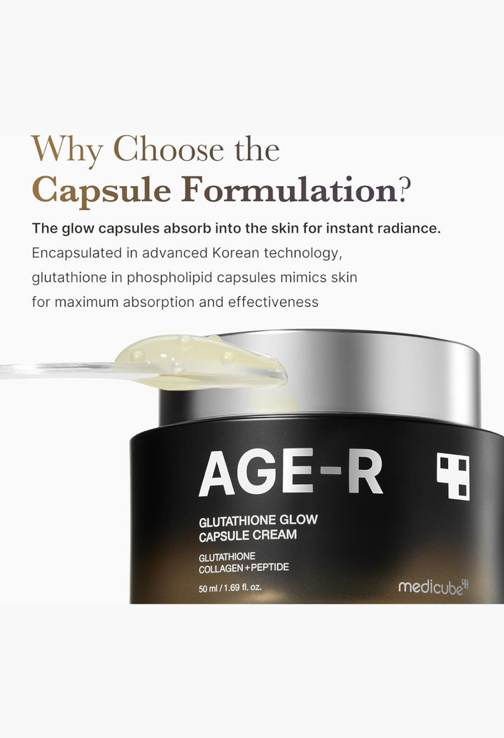 GLAM MODA AGE-R Glutathione Glow Capsule Cream in a black jar with a clear spatula holding a dollop of cream