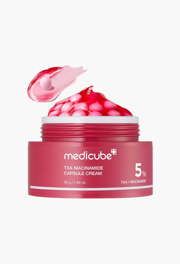 GLAM MODA TXA Niacinamide Capsule Cream in a red jar with visible red gel and pink capsules for skin brightening