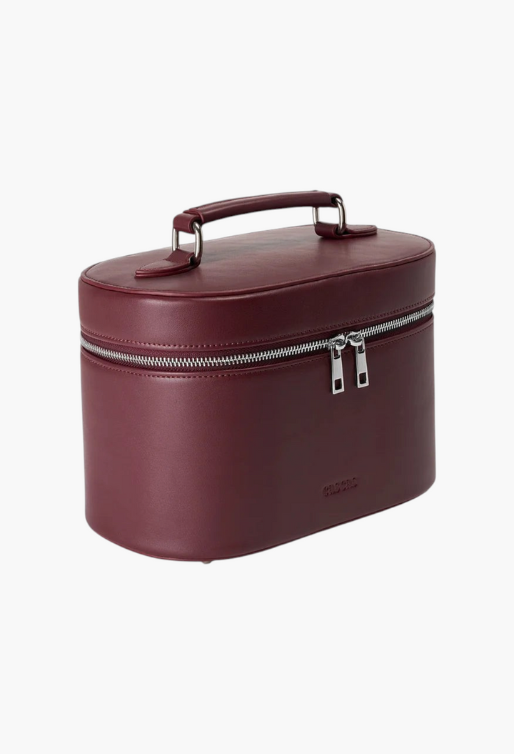 GLAM MODA espresso brown oval makeup vanity case in premium vegan leather with silver hardware and top handle