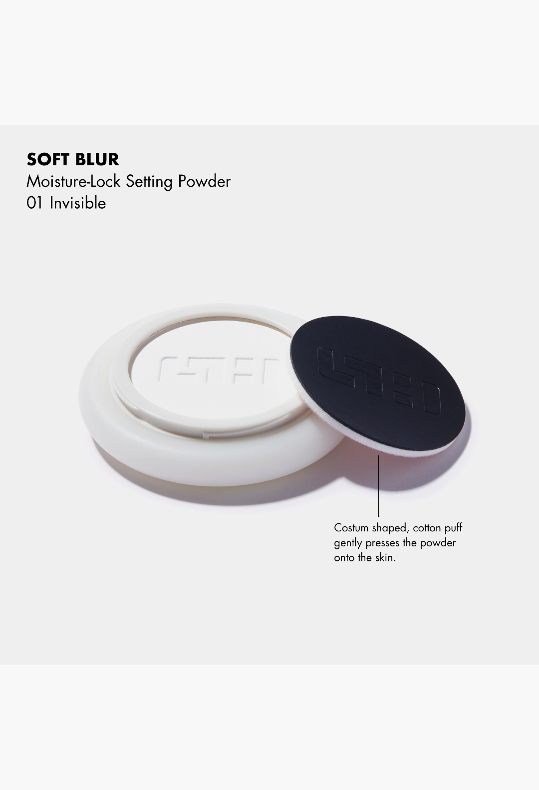 GLAM MODA SOFT BLUR moisture-lock setting powder in 01 Invisible with a custom shaped black cotton application puff.