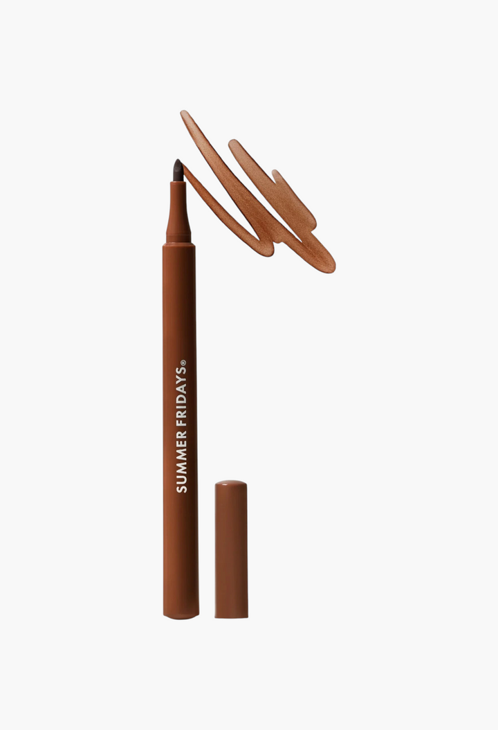 GLAM MODA Flushed Lip Stain in a warm brown shade with a felt-tip applicator and a matching cap on a white background