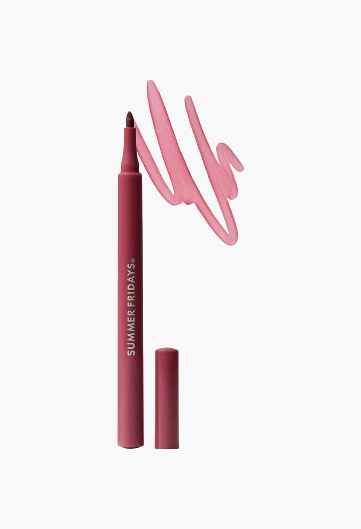 GLAM MODA Flushed Lip Stain pen in a soft pink shade with a matching cap and a swatch of the color on a white background