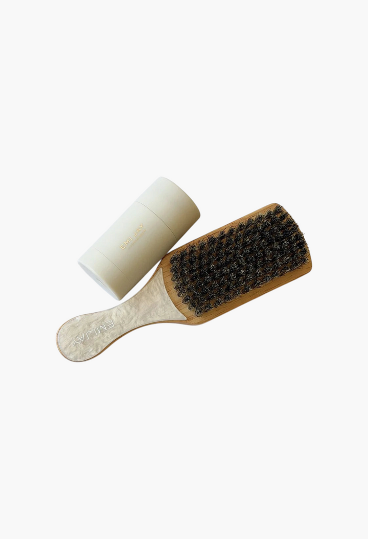 GLAM MODA Sweet and Sleek Styling Gift Set featuring a white Angelstick and a wooden mini boar bristle hair brush.