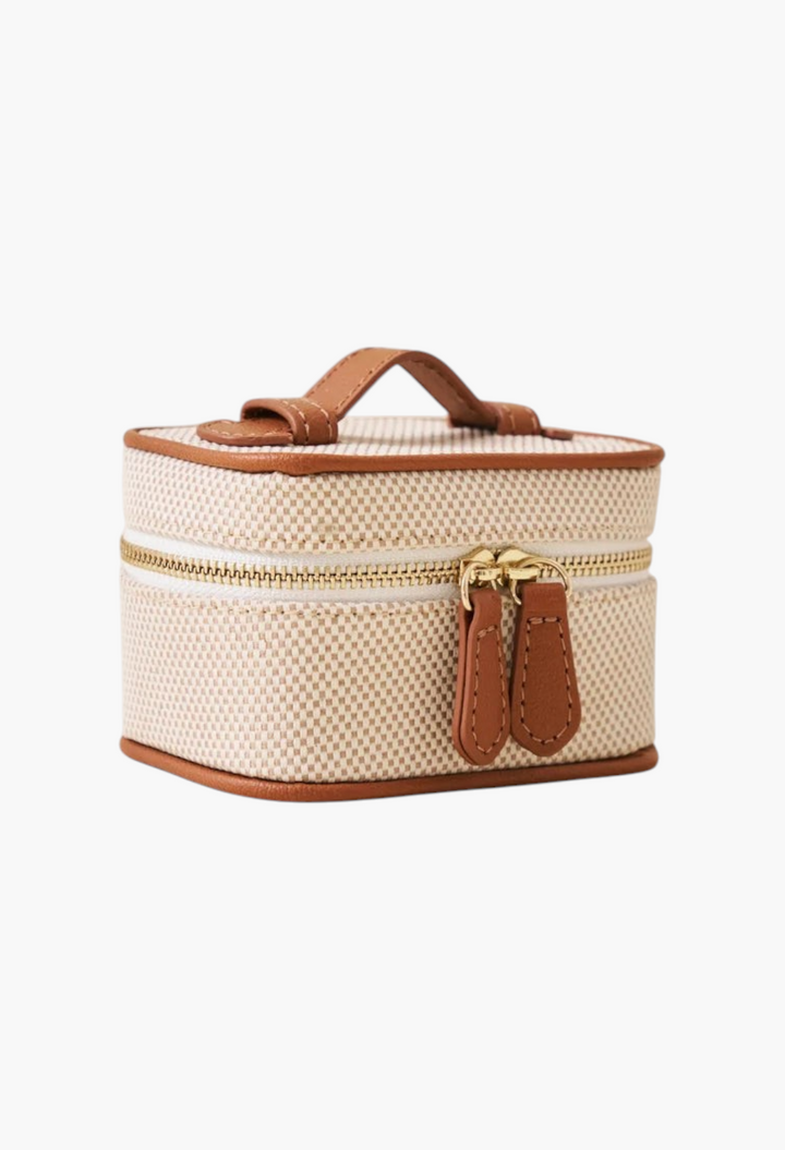 GLAM MODA mini jewellery case in beige and white checkerboard canvas with brown leather trim and gold zipper pulls.