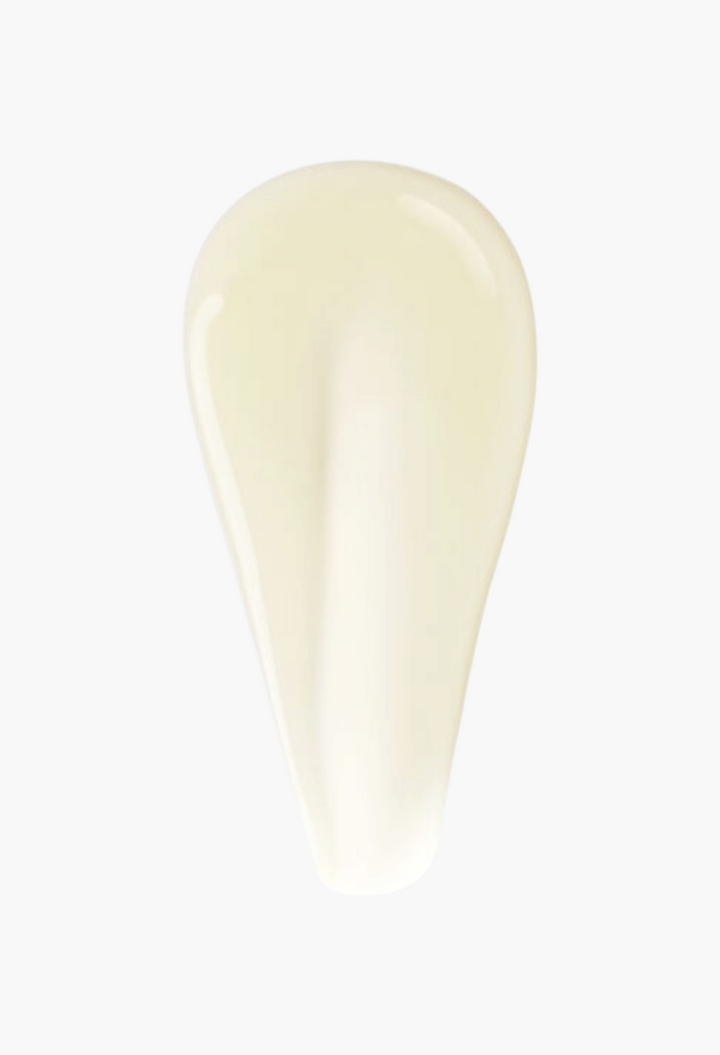 GLAM MODA Oribe Signature Shampoo texture swatch showing a smooth, pale yellow, rich restorative hair cleanser.