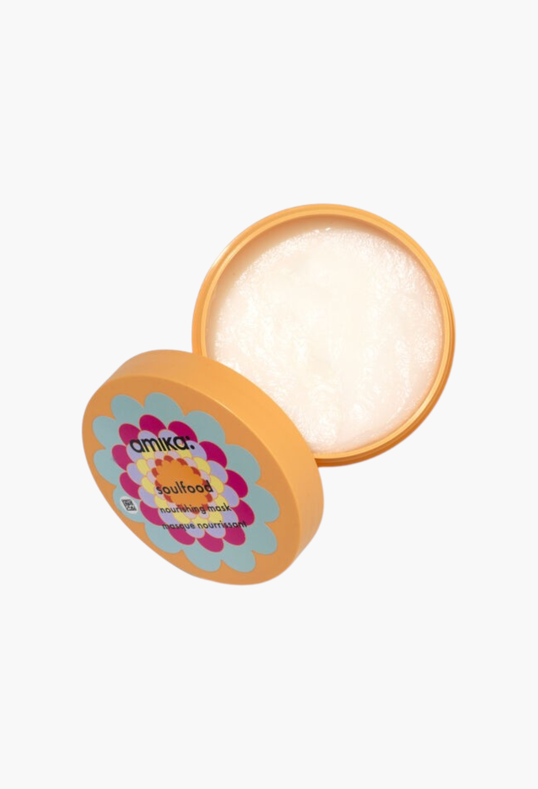 GLAM MODA Amika Soulfood Nourishing Mask in an open orange jar with a floral lid, showing rich creamy hair treatment.