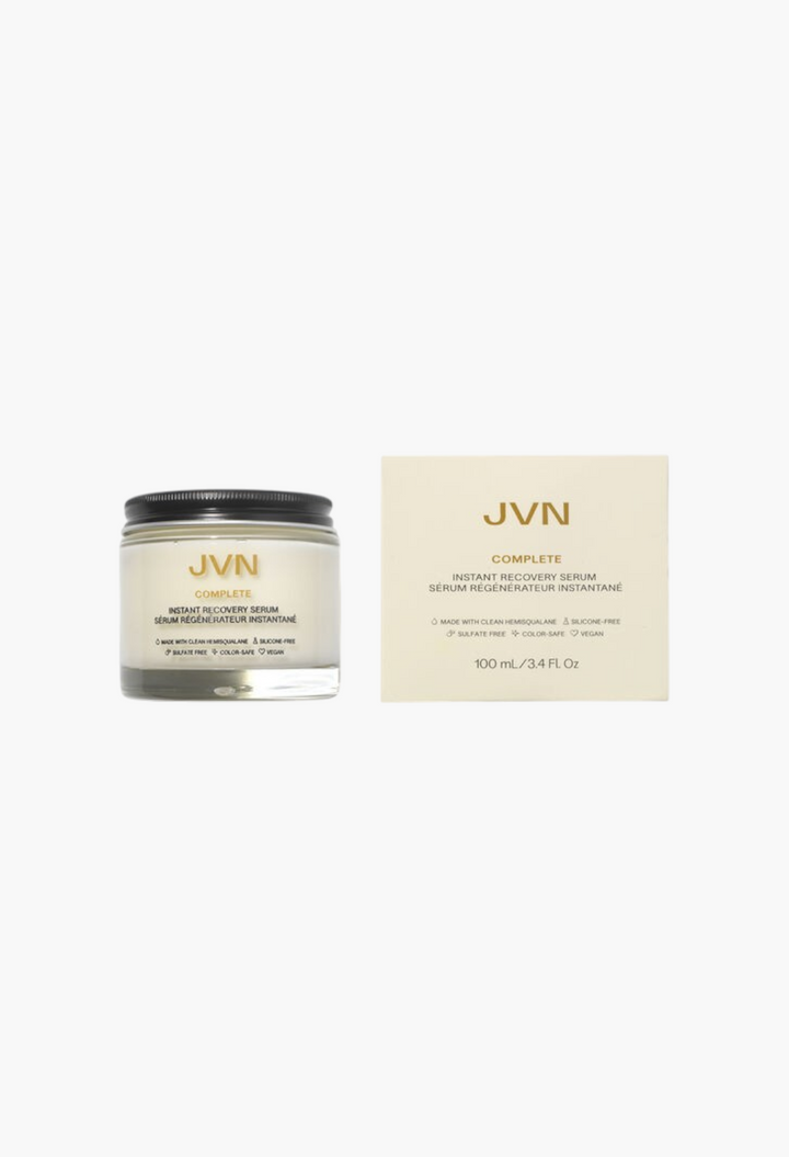 GLAM MODA JVN Complete Instant Recovery Serum in a glass jar with its cream-coloured product box on a white background.