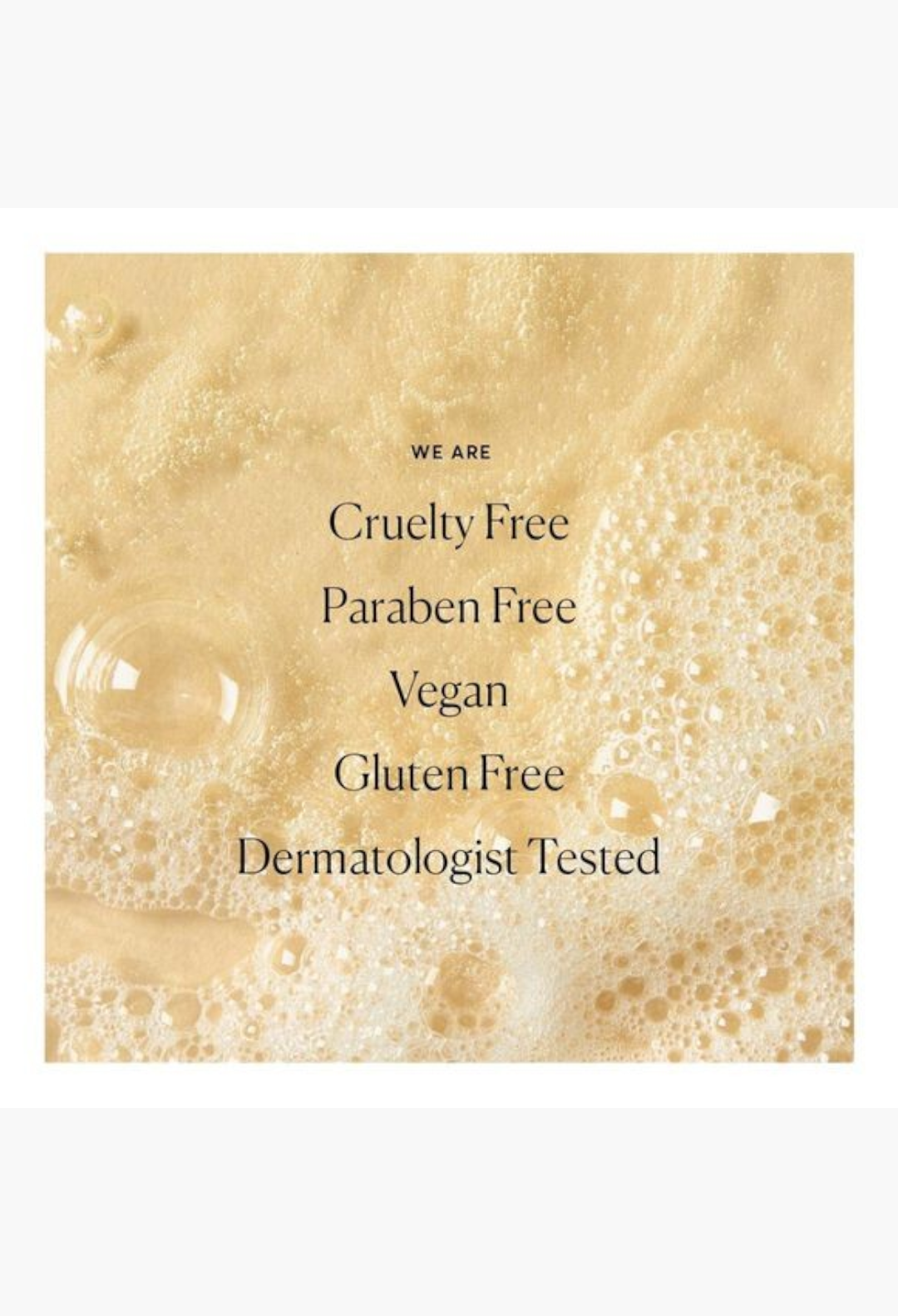 GLAM MODA Naturium The Perfector Salicylic Acid Body Wash texture showing bubbly, golden exfoliating cleanser formula