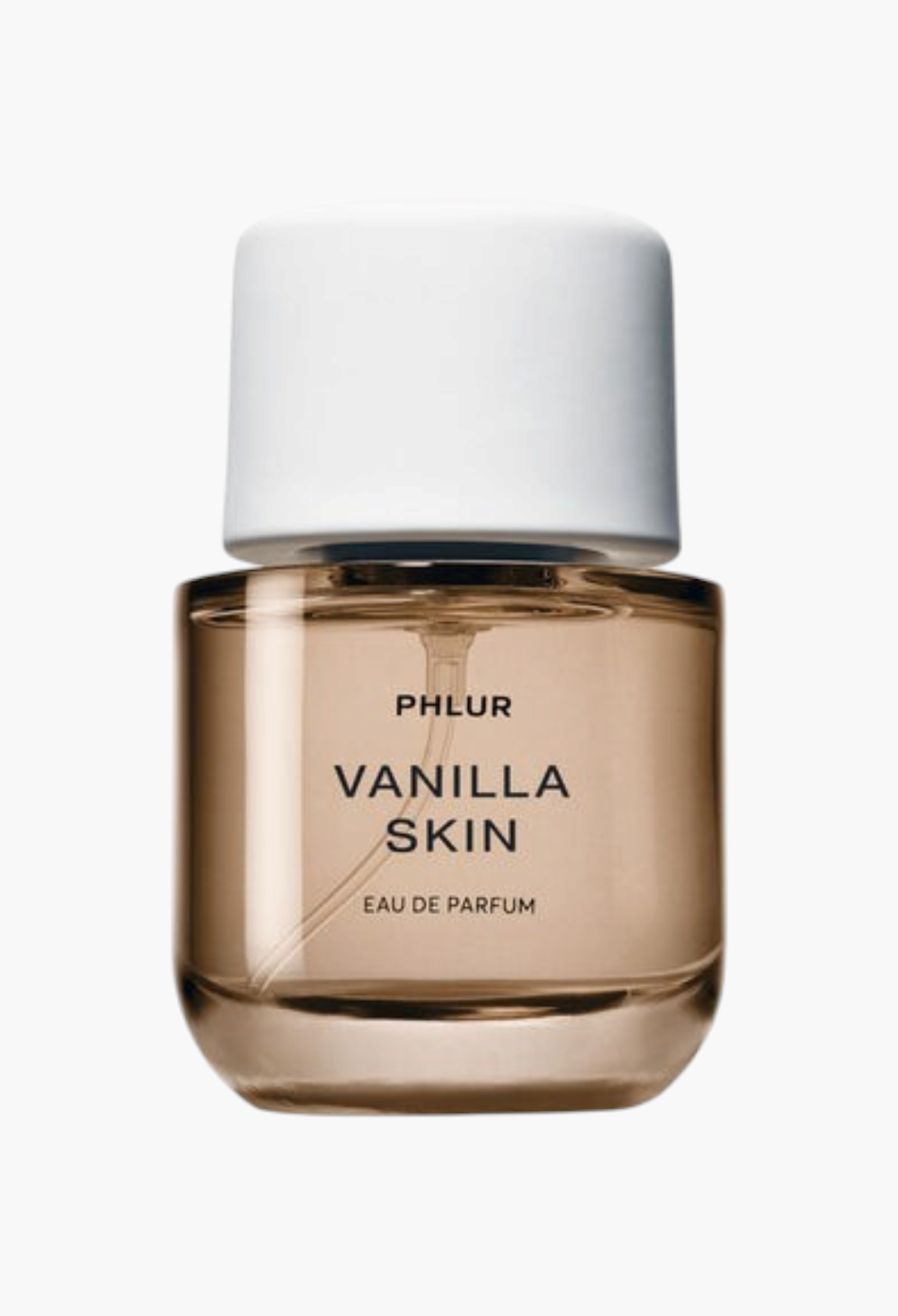GLAM MODA Phlur Vanilla Skin eau de parfum in a clear glass bottle with a white cap and warm amber fragrance liquid.