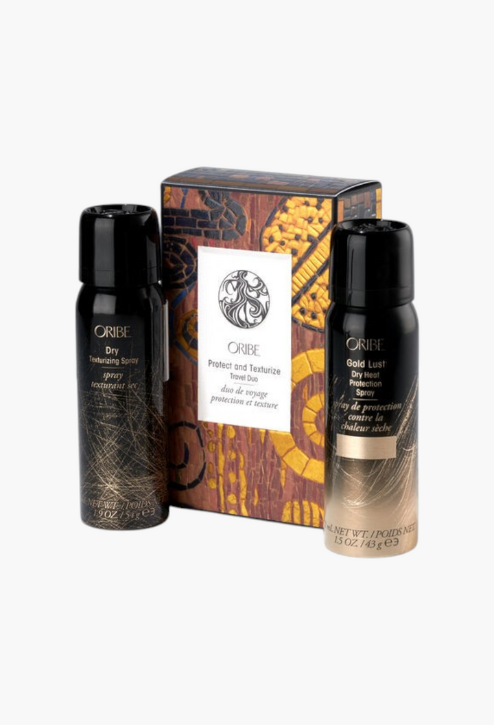 GLAM MODA Oribe Protect and Texturize Travel Duo featuring Gold Lust heat protection and dry texturizing hair sprays.