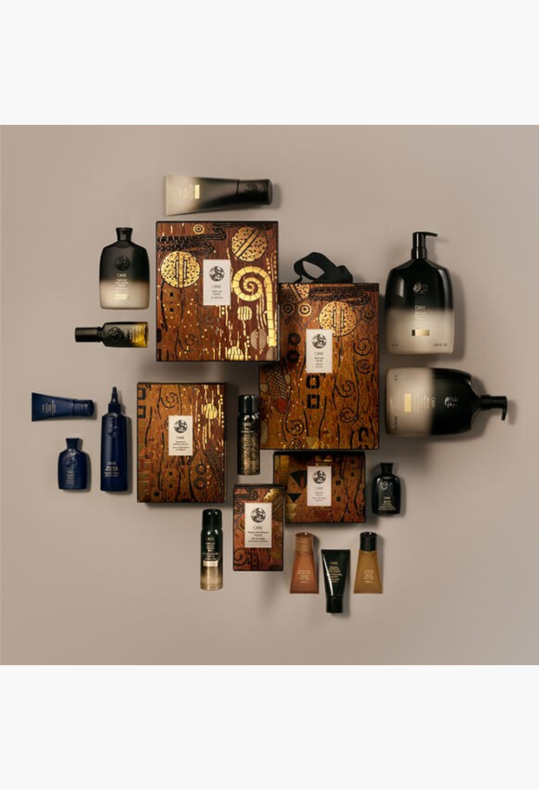 GLAM MODA Oribe Protect and Texturize Travel Duo set featuring heat protection and dry texturizing hair sprays.