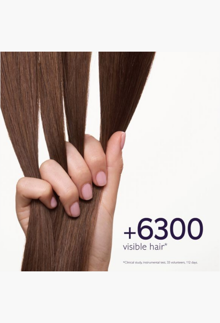 GLAM MODA hair density and volume treatment shampoo shown with a hand holding thick, healthy brown hair strands.
