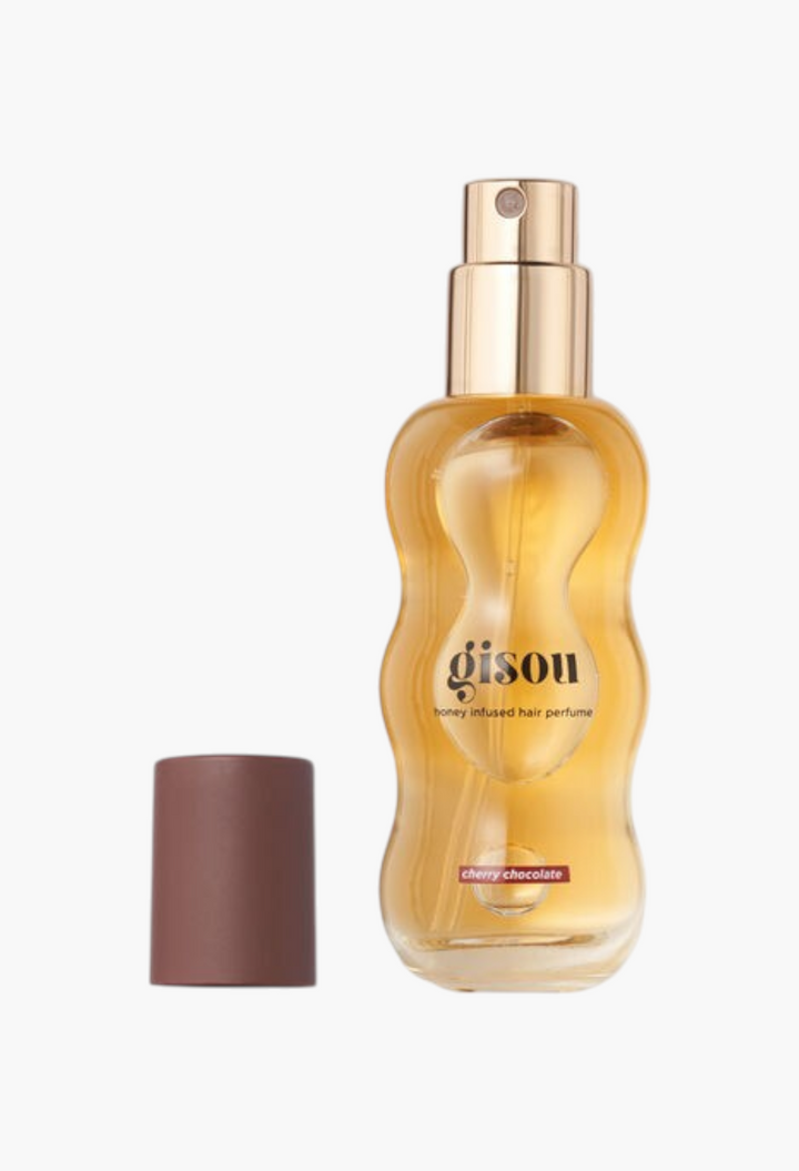GLAM MODA Gisou Cherry Chocolate hair perfume in a curved glass bottle with gold spray nozzle and brown cap