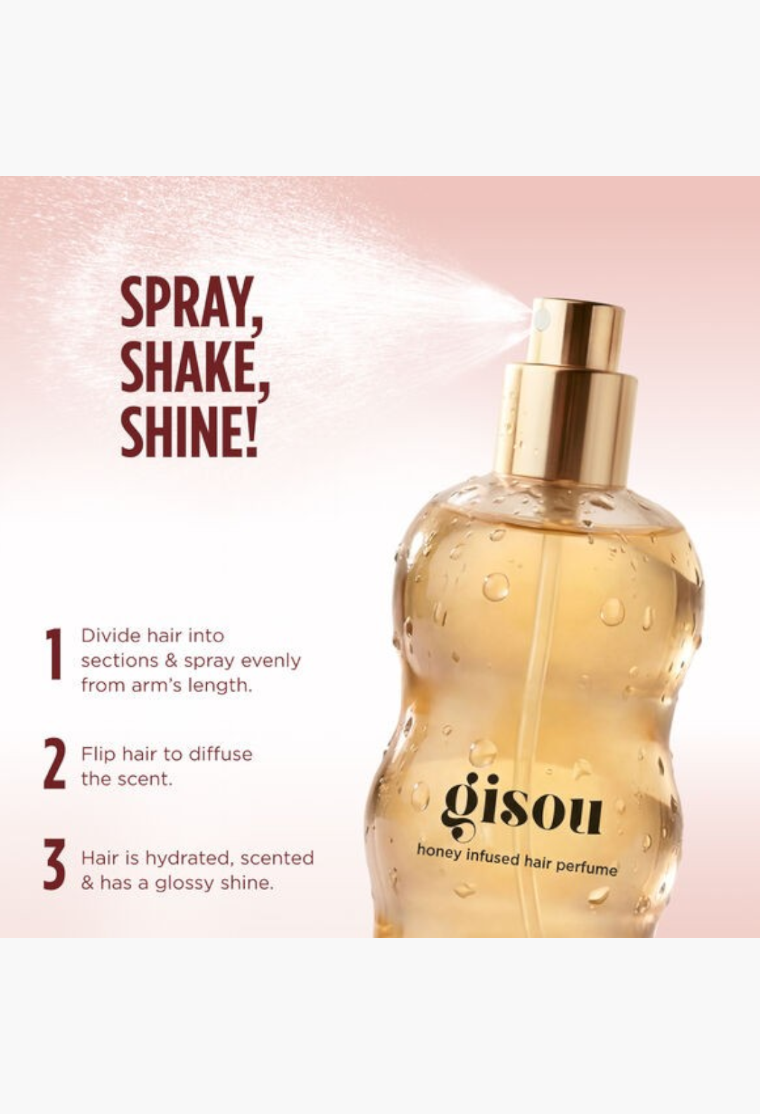 GLAM MODA Gisou honey infused hair perfume bottle with gold cap and application instructions on a soft pink background