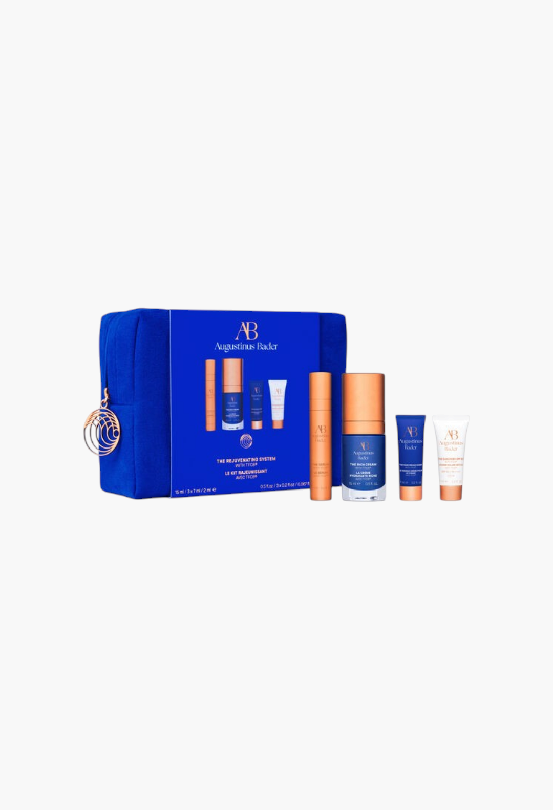 GLAM MODA Augustinus Bader The Rejuvenating System skincare set featuring four travel-sized creams and a blue pouch.