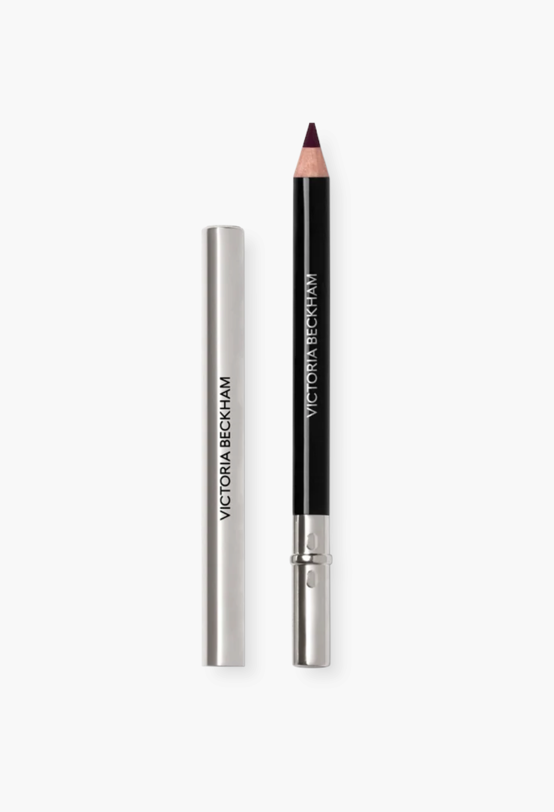 GLAM MODA Victoria Beckham Beauty Lip Definer pencil in a deep plum shade with a sleek silver cap.