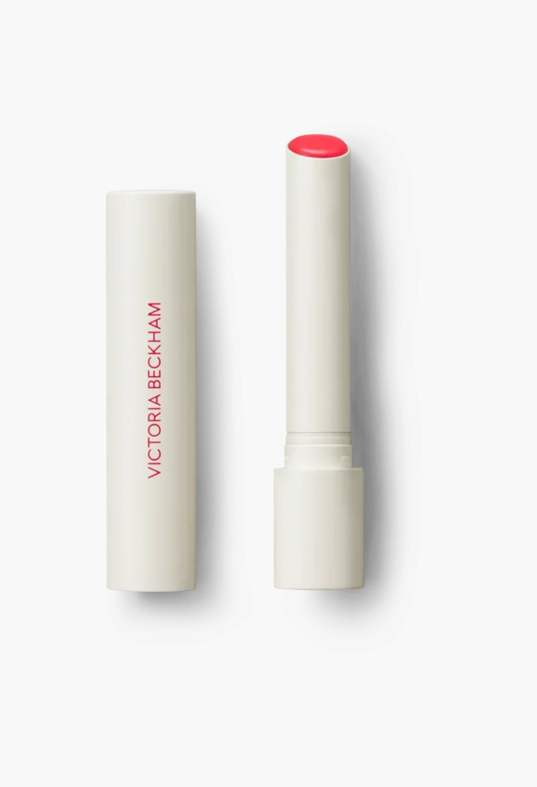 GLAM MODA Posh Balm Nourishing Lip Shine in a sleek white twist-up tube with a vibrant pink tinted balm bullet.