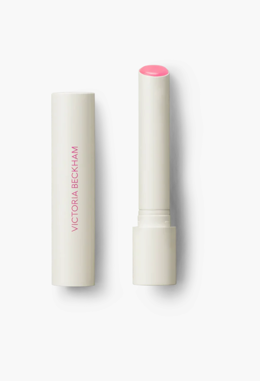 GLAM MODA Posh Balm nourishing lip shine in a sleek white twist-up tube with a pink tinted balm bullet.