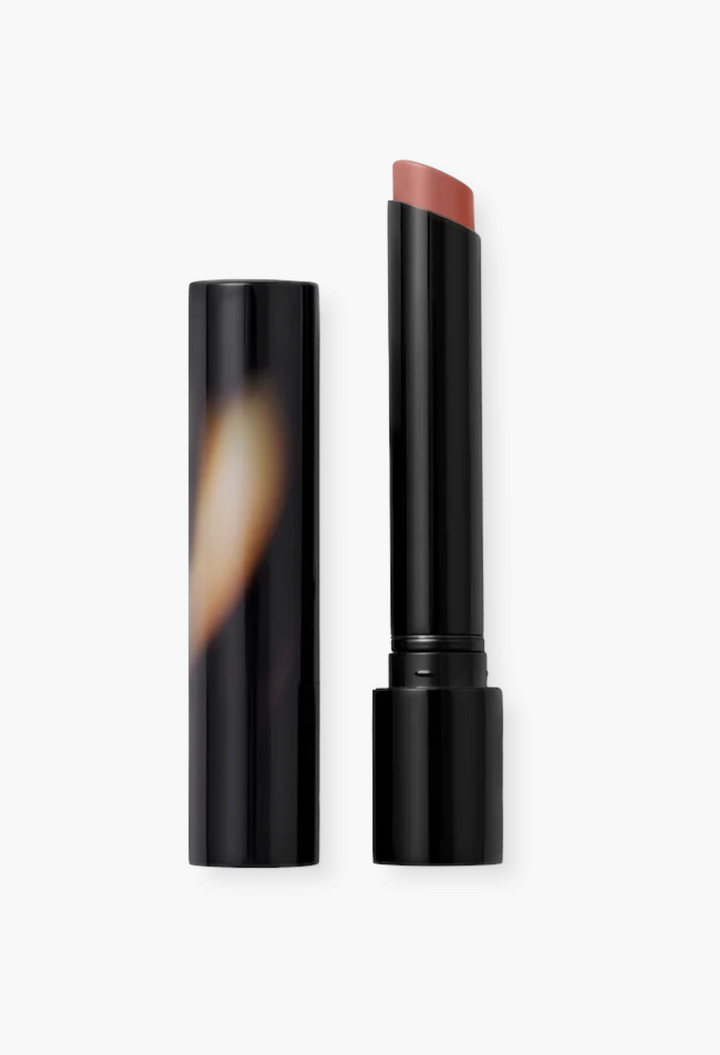 GLAM MODA Posh Lipstick in Spice, a mid-tone ginger shade with a creamy, moisturizing balm-like texture.