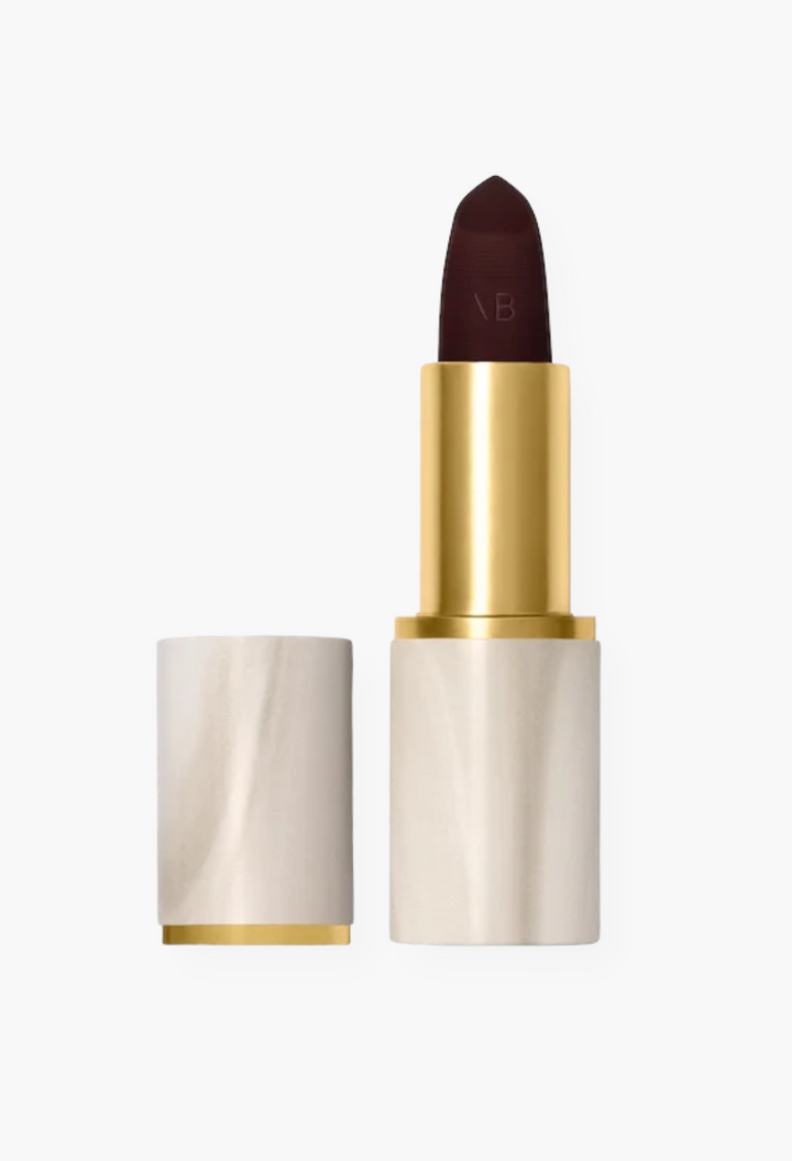 GLAM MODA Rouge Victoria matte lipstick in a deep red shade with a polished alabaster case and gold accents.