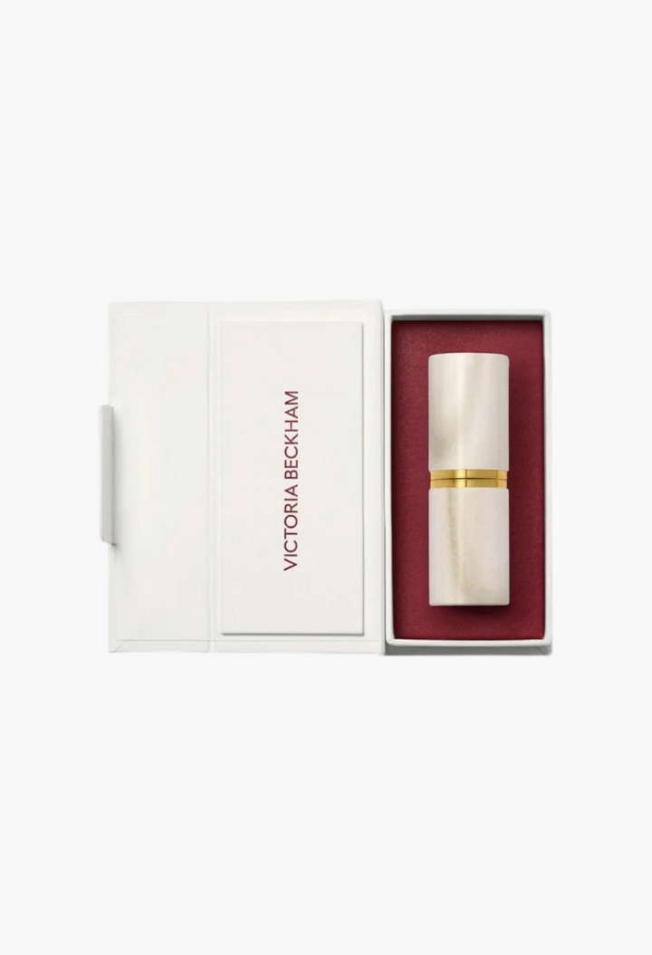 GLAM MODA Rouge Victoria matte lipstick in a unique polished alabaster case with gold accents inside a white box.