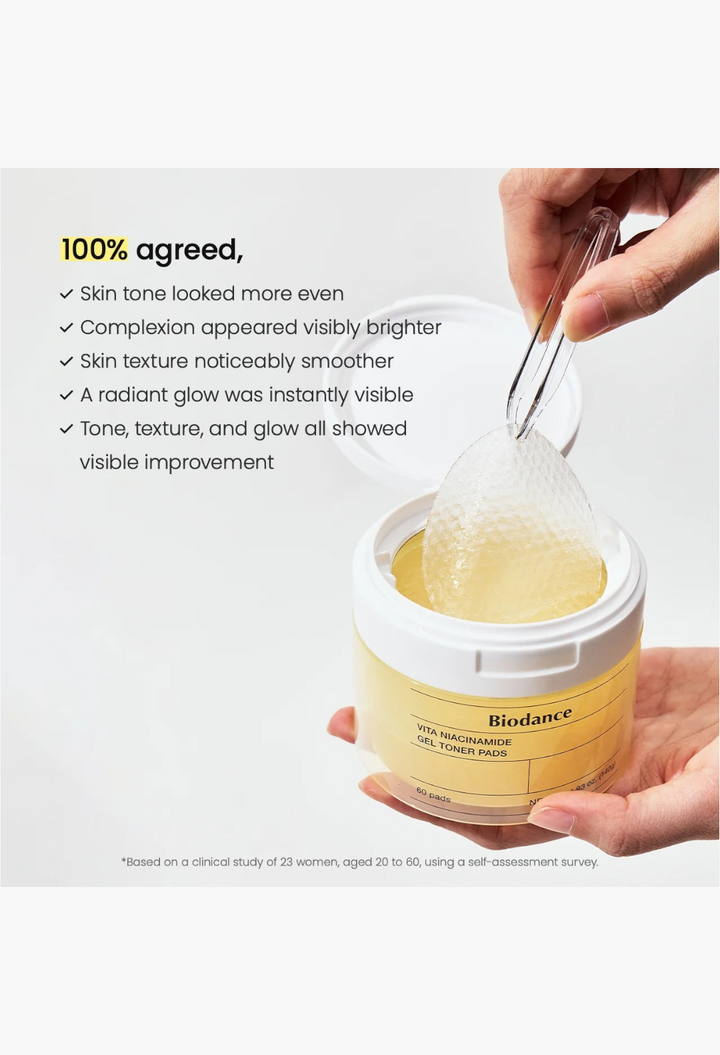 GLAM MODA Biodance Vita Niacinamide Gel Toner Pads being lifted from a jar with tweezers, showing clinical results.