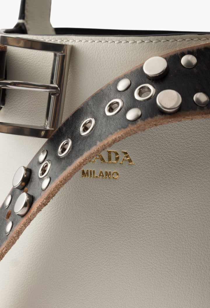White/Black - Prada Buckle Leather Bucket Bag With Studded Belt - GLAM MODA