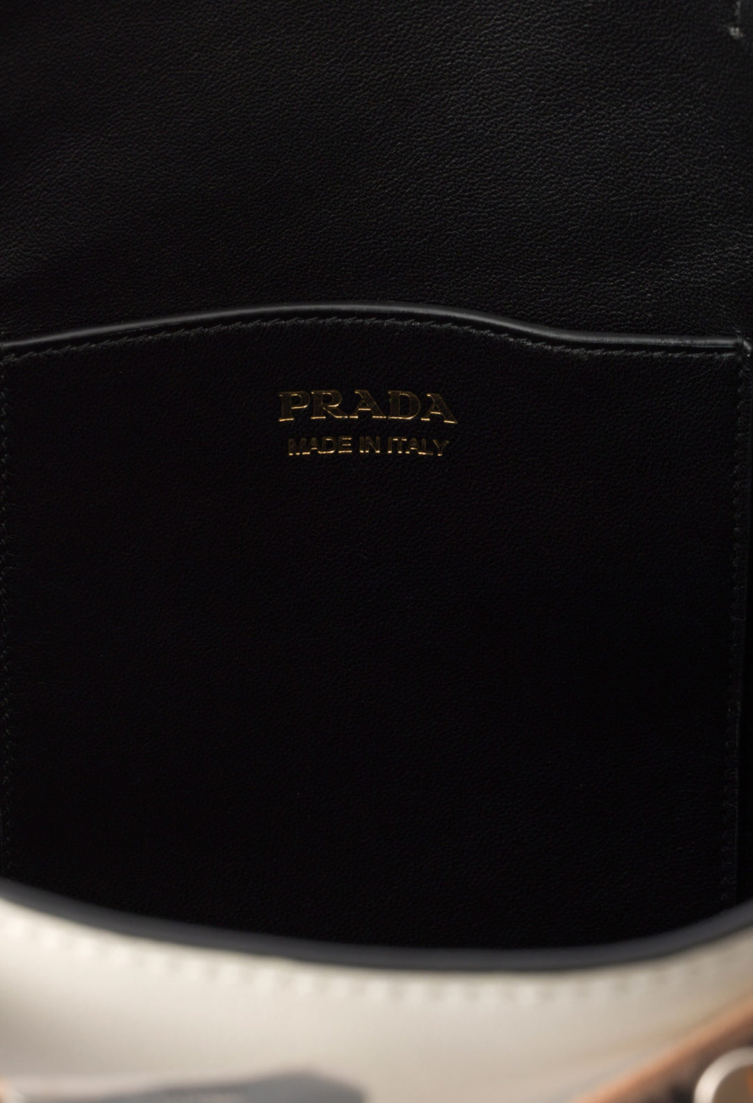 White/Black - Prada Buckle Leather Bucket Bag With Studded Belt - GLAM MODA