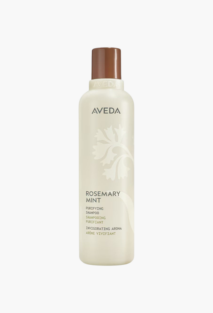 GLAM MODA Aveda Rosemary Mint Purifying Shampoo in a beige bottle with a brown cap for clarifying hair.