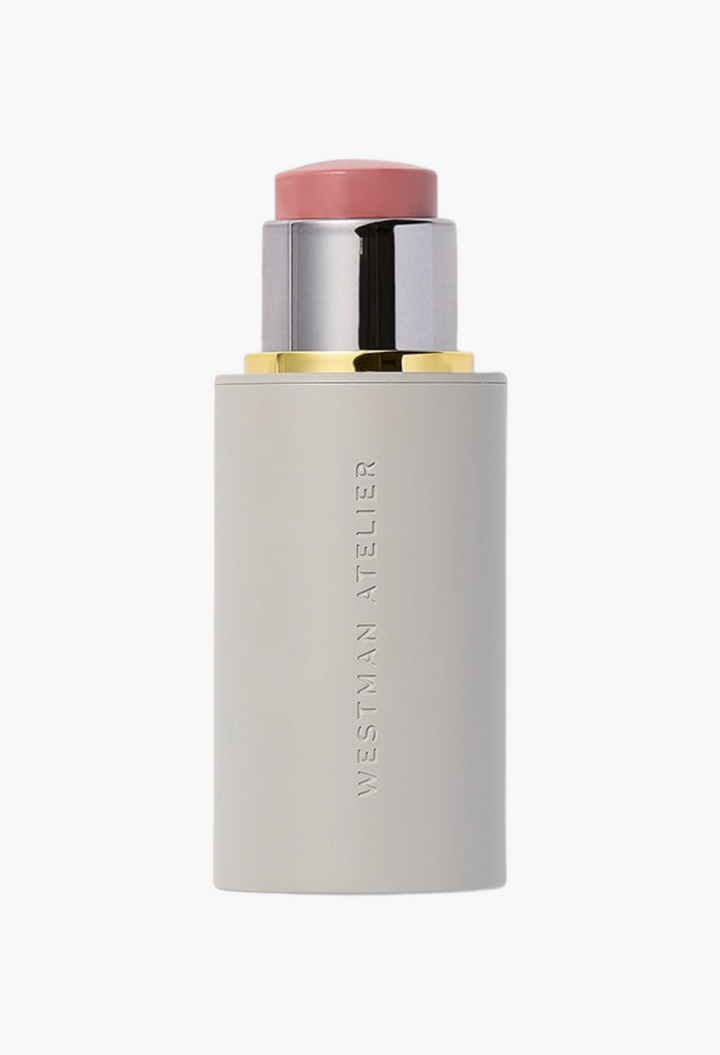 GLAM MODA Baby Cheeks Blush Stick in a soft pink shade with a sleek grey twist-up applicator tube