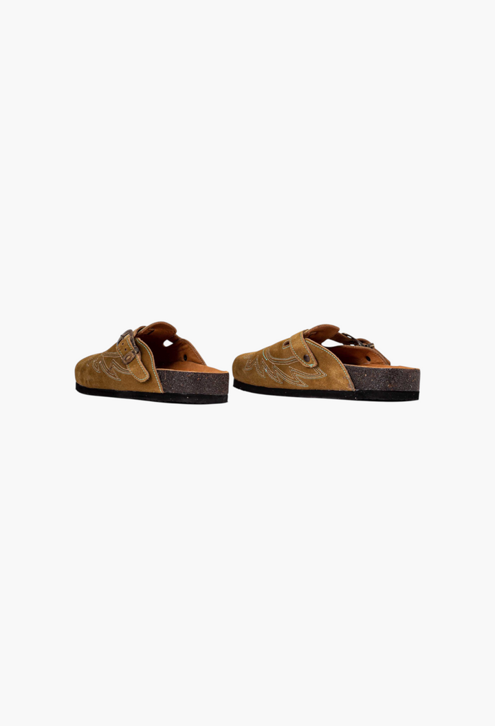 GLAM MODA camel suede cowboy clogs with eagle stitching, side buckle closure, and cork soles, side view.