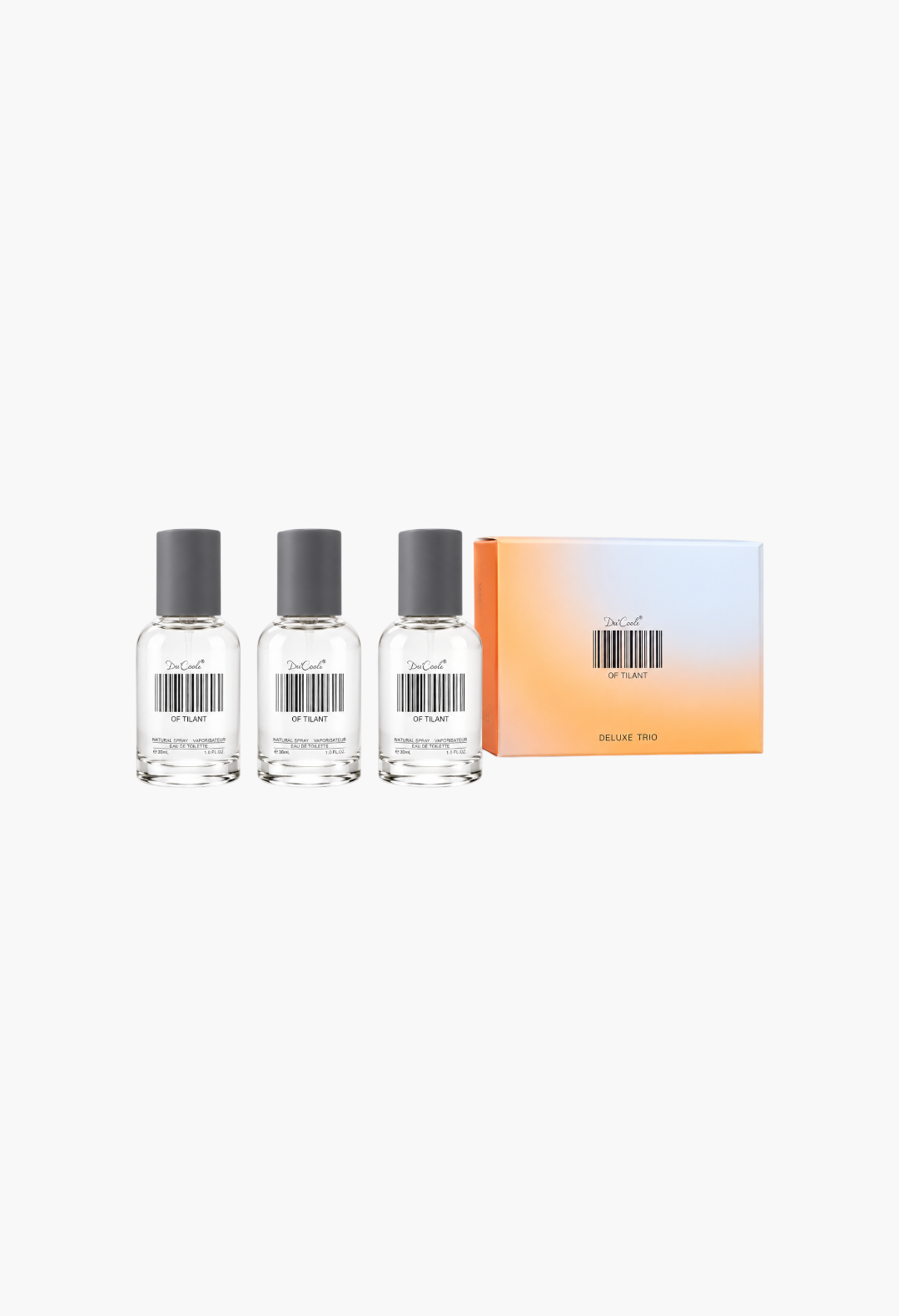 GLAM MODA Deluxe Trio set featuring three glass room and linen spray bottles with grey caps and a gradient gift box.