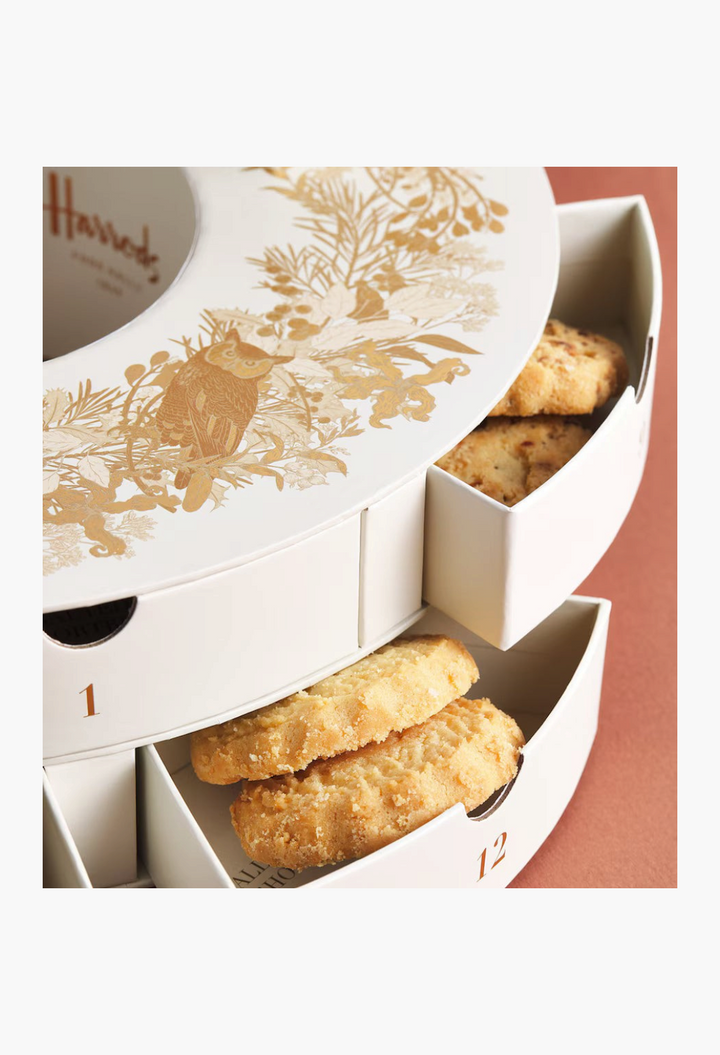 GLAM MODA 12 Days of Biscuits Advent Calendar in a white tin with gold owl and botanical illustrations