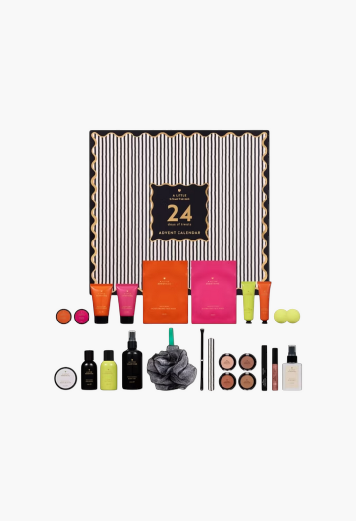 GLAM MODA A Little Something 24-day beauty advent calendar with assorted skincare, makeup, and bath treats.