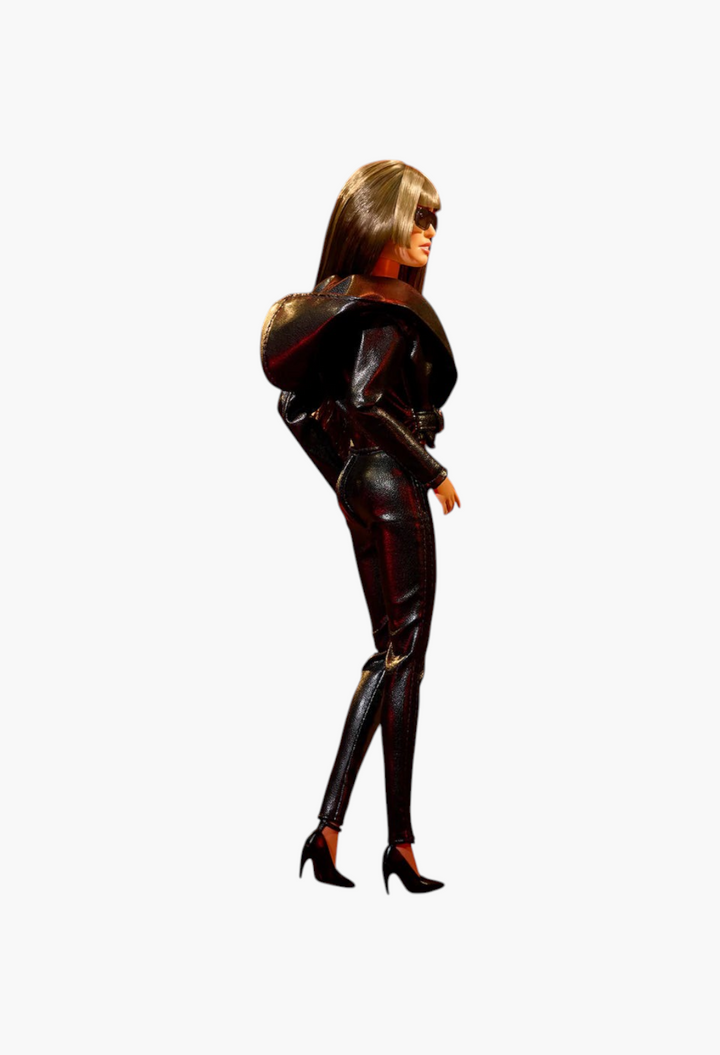 GLAM MODA collectible Barbie doll inspired by Miley Cyrus wearing a black faux-leather outfit and sunglasses
