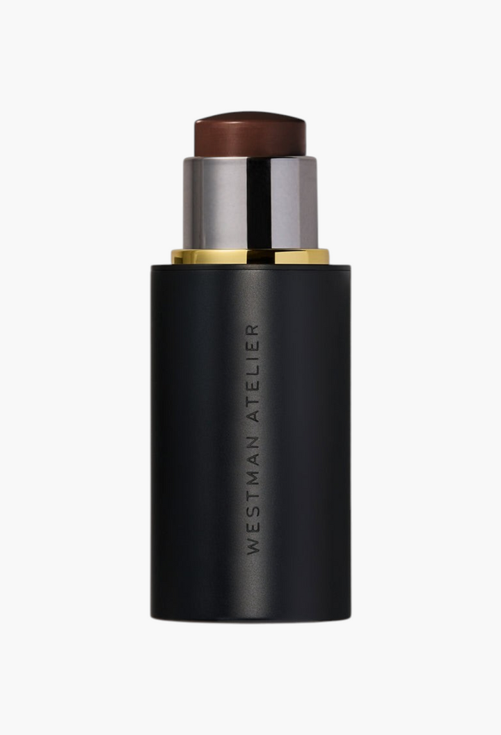GLAM MODA Face Trace Contour Stick in a sleek black twist-up tube with a rich brown cream formula for definition.
