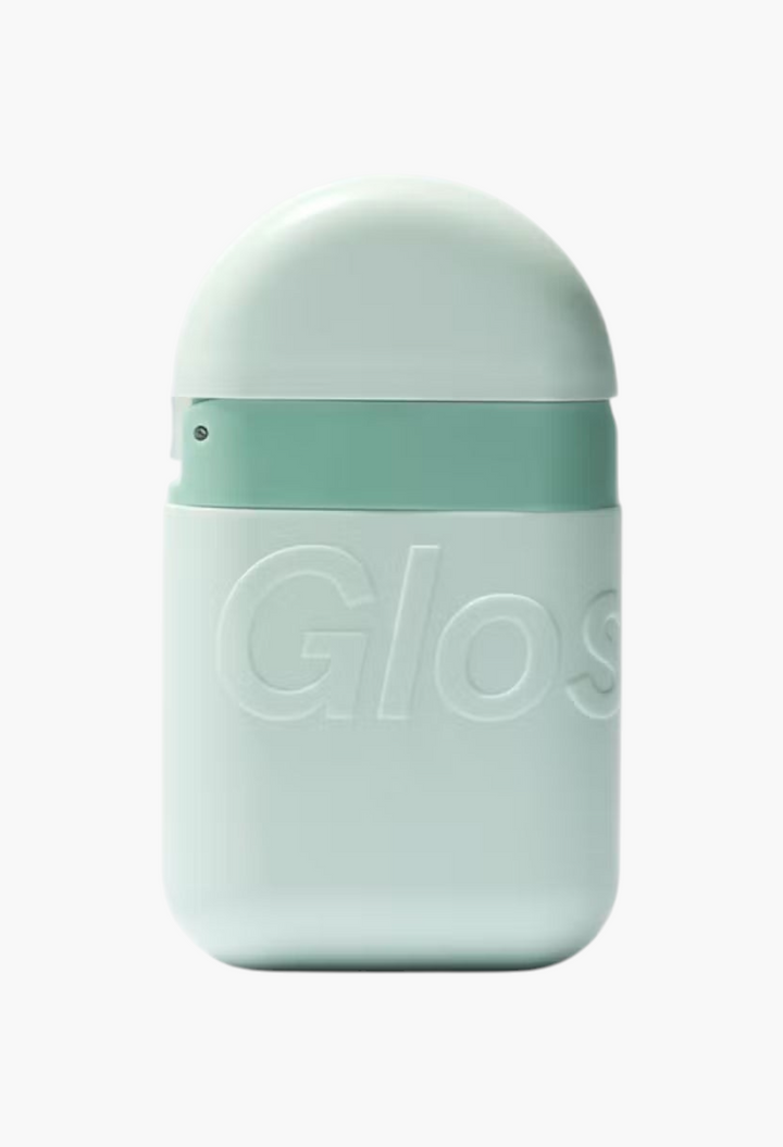 GLAM MODA moisturizing hand cream in a portable light green palm-sized pod with a secure click-to-close cap.