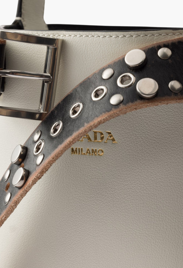 White/Black - Prada Buckle Leather Bucket Bag With Studded Belt