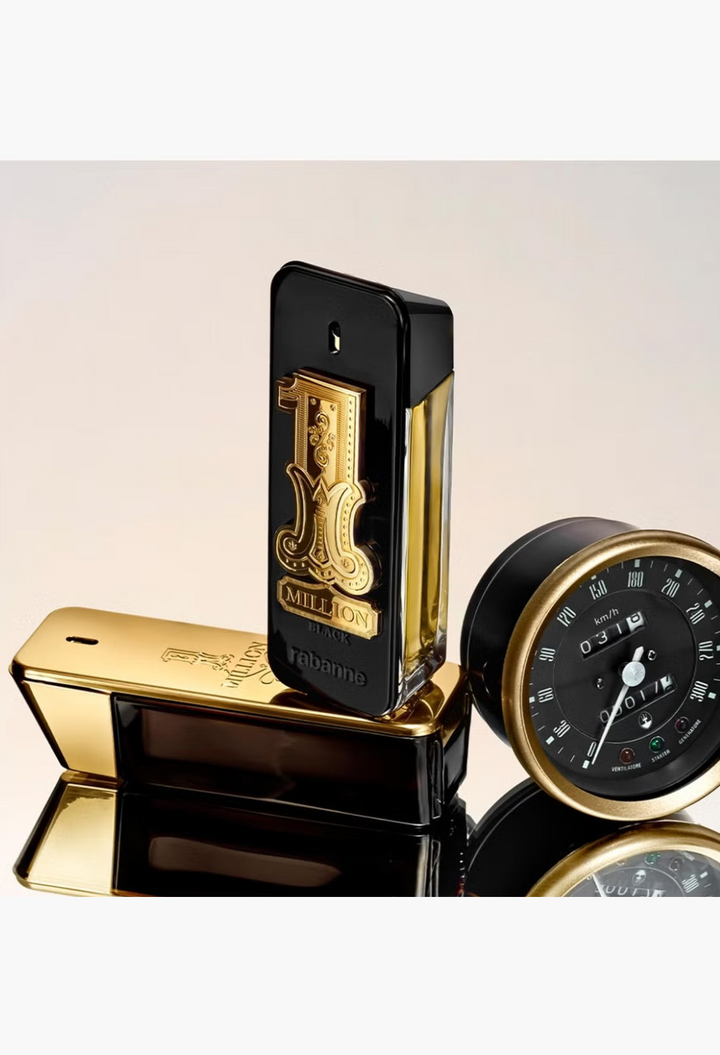GLAM MODA Rabanne 1 Million Black Eau de Parfum bottles in black and gold with a vintage speedometer gauge