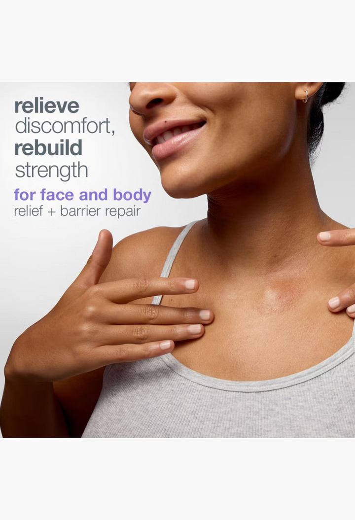 GLAM MODA model applying Dermalogica Stabilizing Repair Serum to her neck to soothe sensitive skin and redness