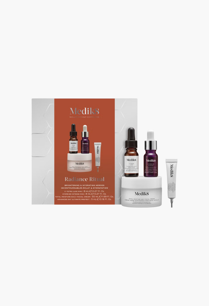 GLAM MODA Medik8 Radiance Ritual skincare set featuring four brightening and hydrating facial products in a gift box.
