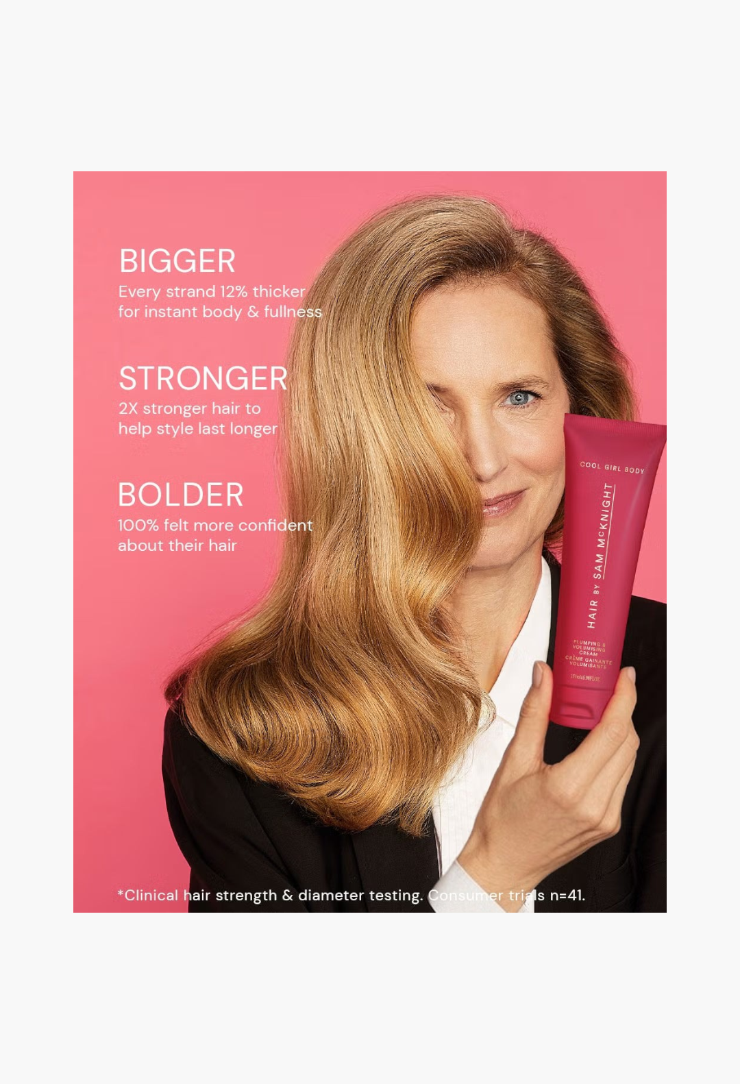 GLAM MODA model holding Hair By Sam McKnight Cool Girl Body Volumising & Plumping Cream against a pink background