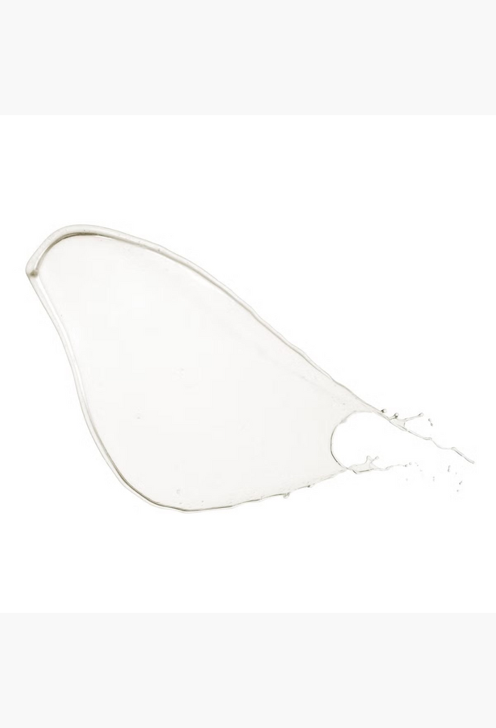 GLAM MODA Virtue Healing Gloss clear liquid hair treatment texture swatch against a plain white background